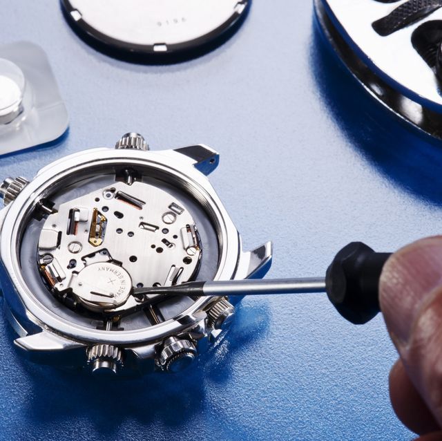 5 Watch Habits That Are Quietly Costing You a Fortune Close-up of a disassembled stainless steel quartz watch with the case back removed, showing a technician using a precision screwdriver to replace a button cell battery.